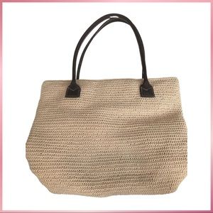 Very lightly used woven bag.